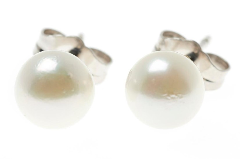 A PAIR OF AKOYA PEARL STUD EARRINGS; 6-6.2mm round cultured pearls of high lustre and good white colour to 18ct white gold post and...