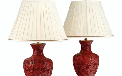 A PAIR OF CHINESE CARVED RED LACQUER BALUSTER VASES MOUNTED AS LAMPS, QING DYNASTY, 19TH CENTURY