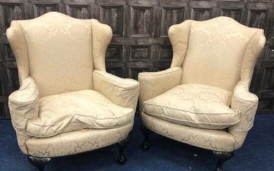 A PAIR OF MAHOGANY FRAMED WING BACK ARM CHAIRS OF QUEEN ANNE DESIGN