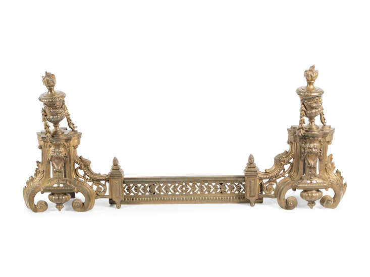 A Pair of Louis XVI Style Gilt Bronze Chenets with a Matching Fender