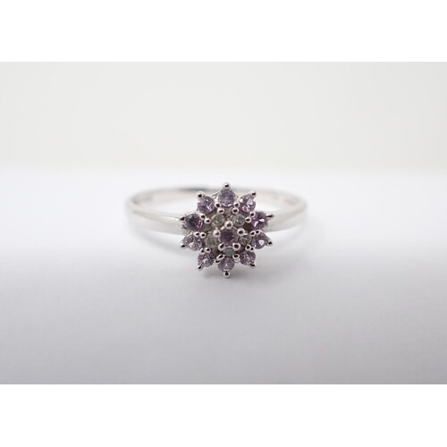 A Pink and White Diamond Cluster Ring peg-set brilliant-cut ...