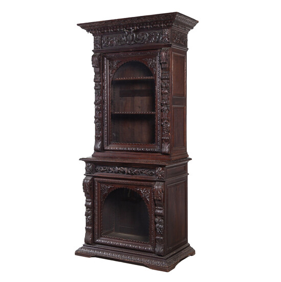 A Renaissance Revival Carved Oak Two-Part Cabinet