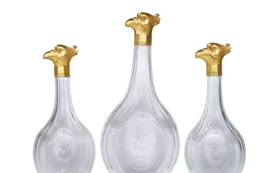 A Set of Three Gilt-Metal-Mounted Crested Glass Decanters, Late 19th Century