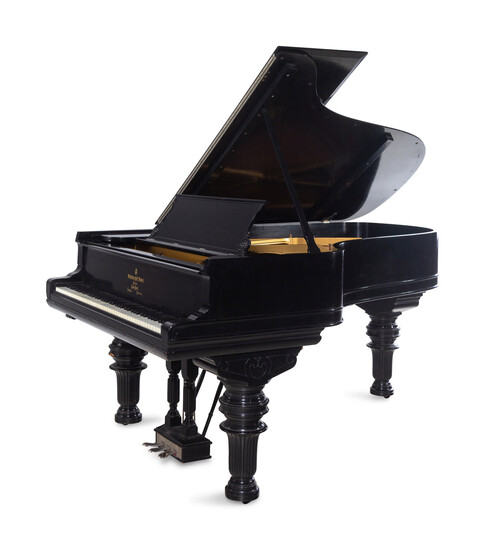 A Steinway and Sons Ebonized Concert Grand Piano