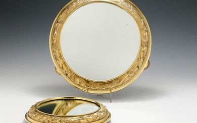 A VICTORIAN SCOTTISH SILVER GILT SUITE OF THREE MIRROR PLATEAUX BY GEORGE EDWARD & SONS