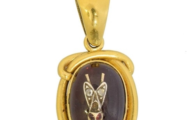 A Victorian foil back garnet and diamond bug pendant