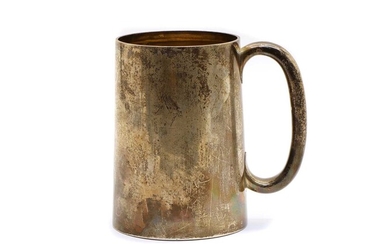 A Victorian glass bottomed silver mug