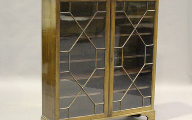 A Victorian mahogany bookcase, fitted with astragal glazed doors, on bracket feet, height 123cm, wid