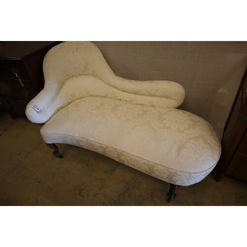 A Victorian walnut chaise longue, length 150cmCONDITION: Uph...