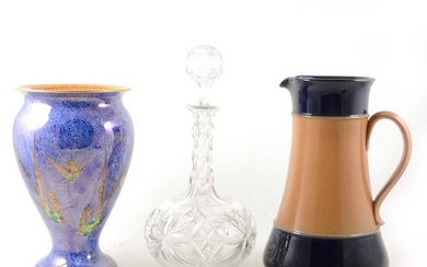 A Wedgwood Hummingbird lustre vase, (damaged), a Doulton stoneware jug and a cut crystal glass decanter.