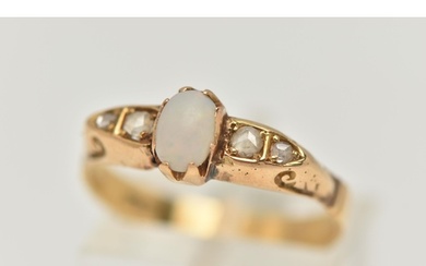 A YELLOW METAL OPAL AND DIAMOND RING, set with a central ova...