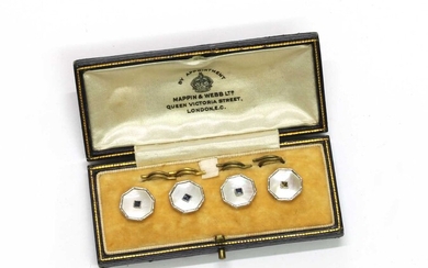 A cased set of four gold sapphire and mother-of-pearl buttons
