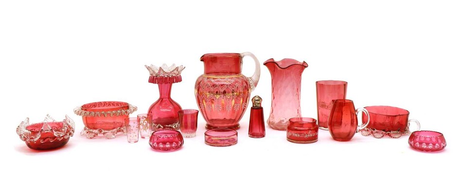 A collection of Victorian and later cranberry glass to include a water jug