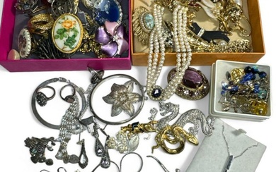 A collection of gold, silver and costume jewellery. To include...