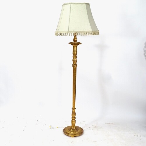 A fluted giltwood standard lamp and shade, height including ...