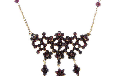 A garnet and red paste necklace.