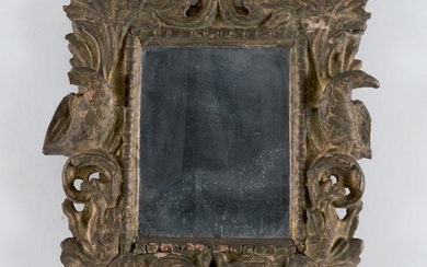 A gilt wood wall mirror, early 18th century