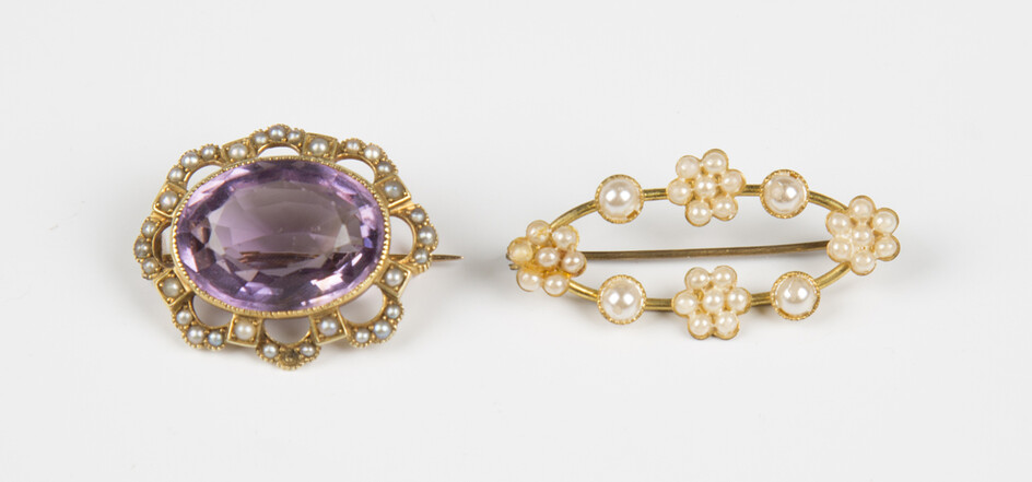 A gold, amethyst and seed pearl oval brooch, collet set with the oval cut pale amethyst within an op