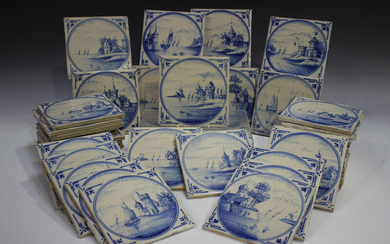 A group of approximately sixty Dutch Delft blue and white tiles, late 19th/early 20th century, each