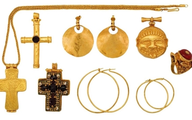 A group of jewellery, comprising: a mask design pendant; a cabochon garnet single stone cross pendant; a drilled bouton coral single stone ring, ring size S; a garnet, seed pearl and enamel reliquary cross pendant; a reliquary cross pendant...