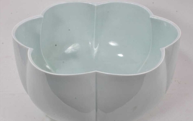 A large and finely potted 20th century Japanese celadon glazed porcelain bowl, of six-petal flower form, possibly by Terui Ichigen, signed to base, 39cm diameter, in original wooden storage box