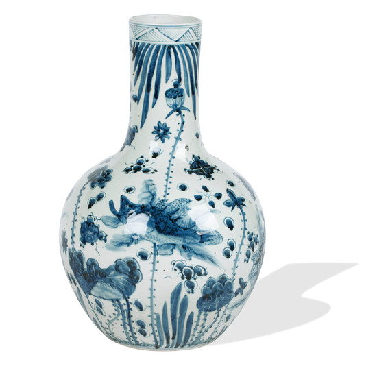 A large blue and white bottle vase