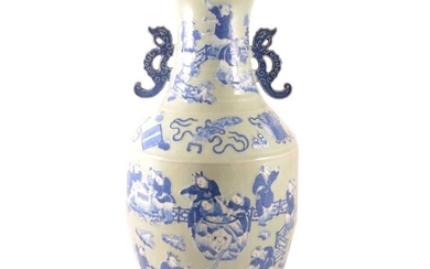 A large floor standing Chinese blue and white vase.