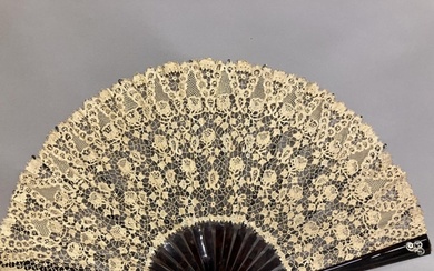 A large late 19th century Carrickmacross lace fan, worked wi...