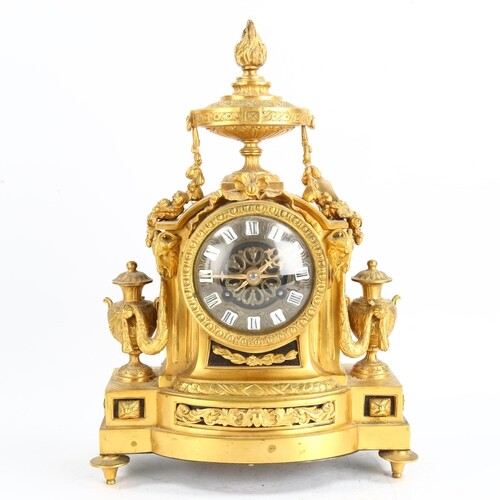 A late 19th/early 20th century French ormolu 8-day mantel cl...