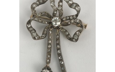 A late 19th/early 20th century diamond ribbon brooch with ta...