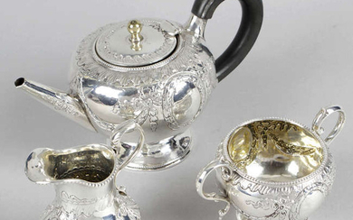 A mid-Victorian silver three piece bachelor tea set.