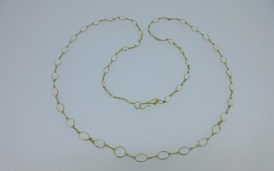 A necklace of spectacle set moonstones