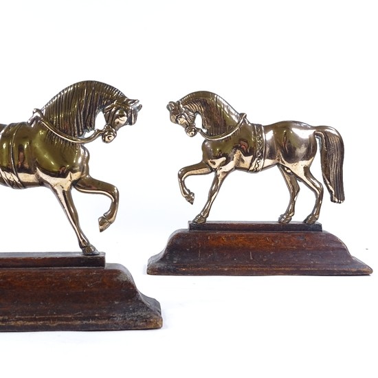 A pair of 19th century relief moulded brass horse design doo...