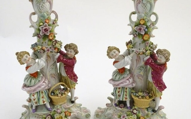 A pair of 19thC German figural lamp bases with two