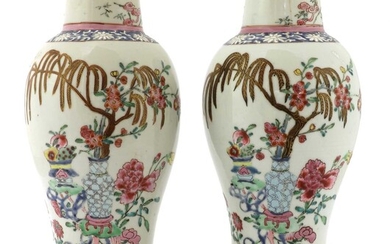 A pair of Chinese export famille rose vases
