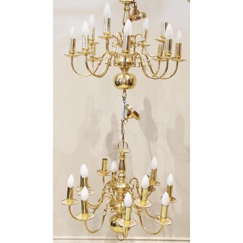 A pair of Dutch style twelve branch gilt metal chandeliers, ...