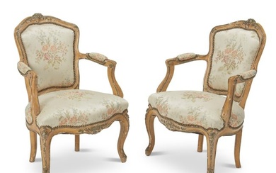 A pair of French Louis XV-style fauteuils