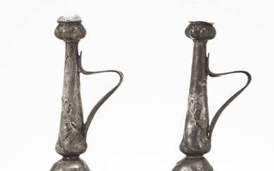 A pair of early 20th century pewter candlesticks, Art Nouveau.