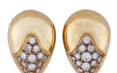 A pair of fourteen karat gold and diamond earrings...