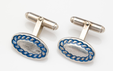A pair of vintage Scottish sterling silver oval cufflinks with...