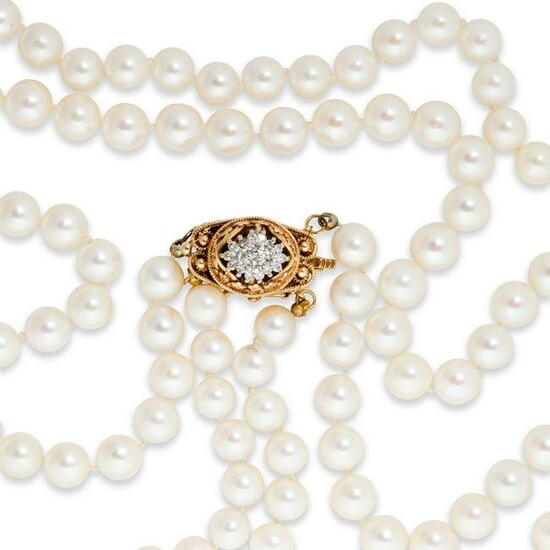 A pearl, diamond and fourteen karat gold necklace