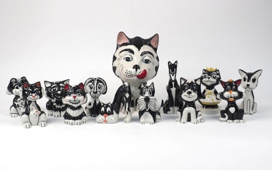 A quantity of Bailey pottery cats, 20th century and later, in black and white glaze colour way, to include a large Lionel Bailey cat licking his lips, additional marks to underside, signed 'JM', '4/25', dated 01.09, 27cm high, together with two...
