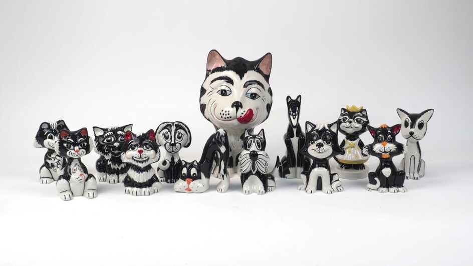 A quantity of Bailey pottery cats, 20th century and later, in black and white glaze colour way, to include a large Lionel Bailey cat licking his lips, additional marks to underside, signed 'JM', '4/25', dated 01.09, 27cm high, together with two...