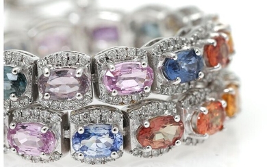 NOT SOLD. A sapphire- and diamond bracelet set with numerous oval-cut multi colours sapphires, mounted in 18k white gold. L. app. 18.5 cm. – Bruun Rasmussen Auctioneers of Fine Art
