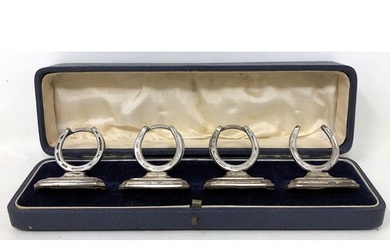 A set of Edward VII silver novelty menu holders, in the form...