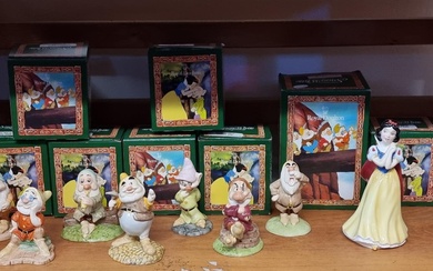 A set of Royal Doulton Snow White and The Seven Dwarfs figur...
