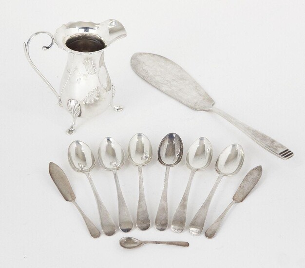 A silver milk jug, Birmingham, c.1957, Joseph Gloster, the tapering body raised on three pad feet, together with a silver serving slice, Birmingham, c.1940, Elkington & Co., six silver teaspoons and two silver butter knives, total weight approx...
