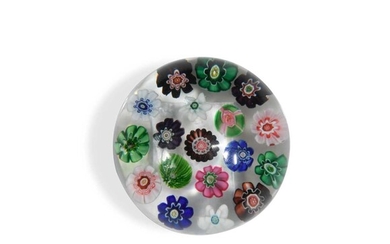 A small Clichy spaced millefiori glass paperweight