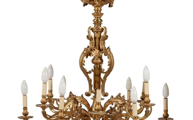 A twelve light brass and gilt chandelier in French taste