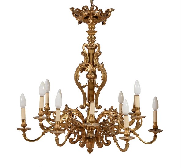 A twelve light brass and gilt chandelier in French taste